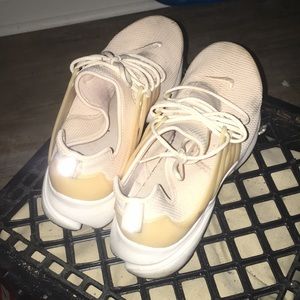 Pink nikes. Need a minor cleaning.